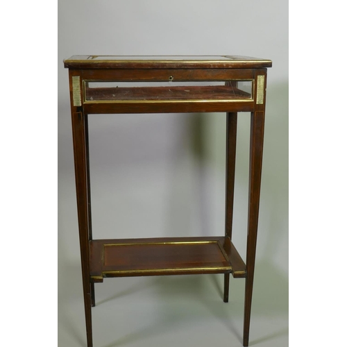 1006 - A Victorian inlaid rosewood bijouterie table with brass mounts, raised on tapering supports united b... 