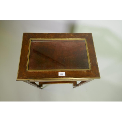 1006 - A Victorian inlaid rosewood bijouterie table with brass mounts, raised on tapering supports united b... 