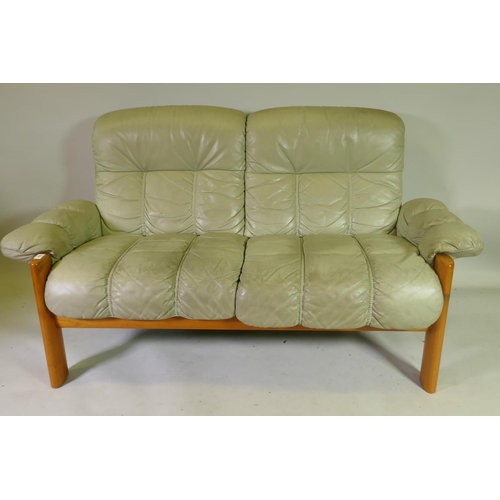 1008 - A vintage Scandinavian teak Ekornes Stressless 'Montana' five piece suite in sage green leather, a t... 