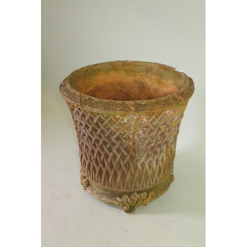1021 - A terracotta garden planter/jardiniere with applied decoration, 55cm diameter, 51cm high