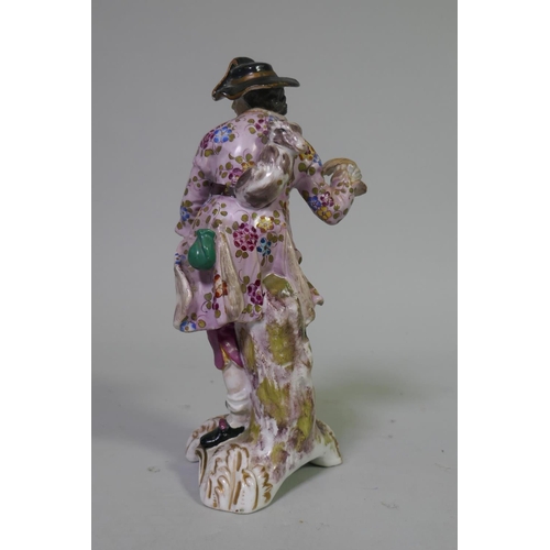 18 - Pair of late C18th/C19th soft paste porcelain figures, possibly Derby, of a street vendor and a hunt... 