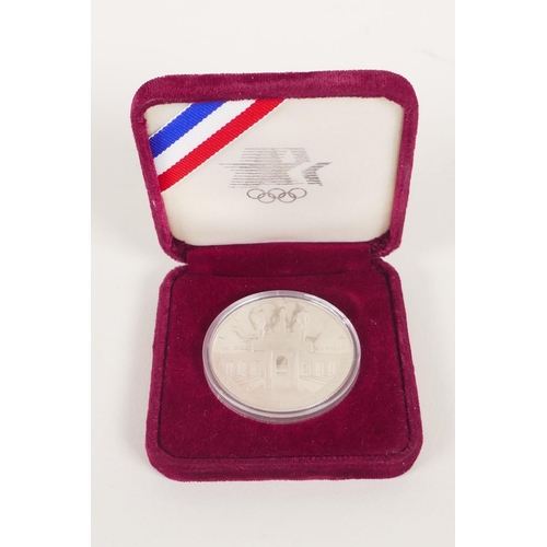 613 - A hallmarked silver fob chain by David Thomas, (London, 1999, with a millennium mark, 55g), and a Un... 