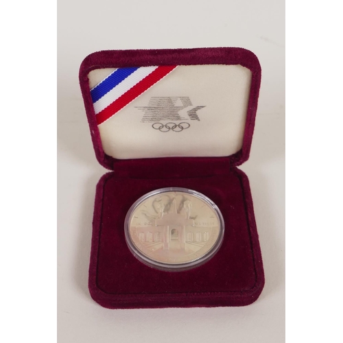 613 - A hallmarked silver fob chain by David Thomas, (London, 1999, with a millennium mark, 55g), and a Un... 