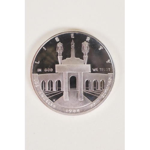 613 - A hallmarked silver fob chain by David Thomas, (London, 1999, with a millennium mark, 55g), and a Un... 