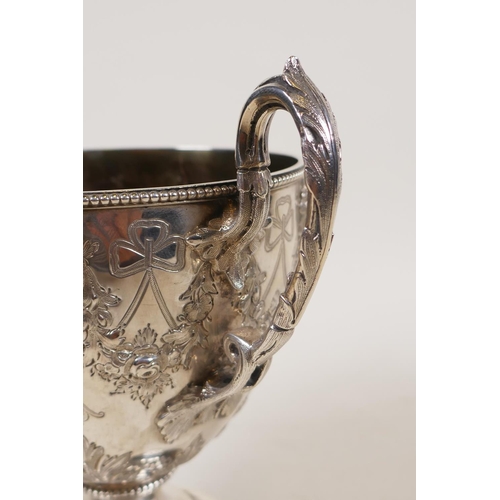 602 - A fine Victorian silver three piece tea set by Martin, Hall & Co, London, 1876, decorated with r... 