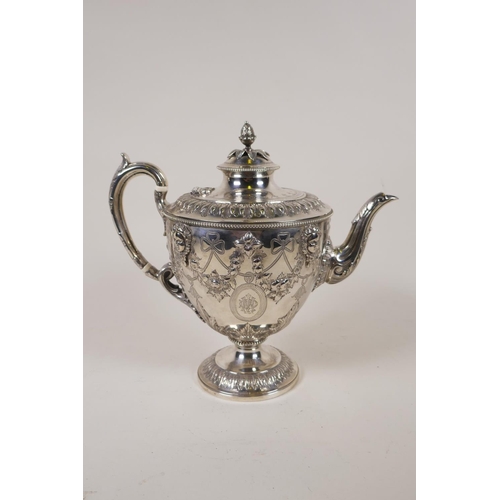 602 - A fine Victorian silver three piece tea set by Martin, Hall & Co, London, 1876, decorated with r... 