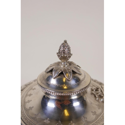 602 - A fine Victorian silver three piece tea set by Martin, Hall & Co, London, 1876, decorated with r... 