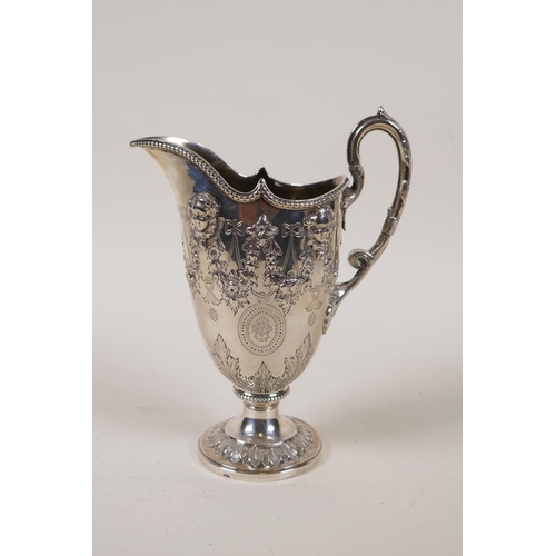 602 - A fine Victorian silver three piece tea set by Martin, Hall & Co, London, 1876, decorated with r... 