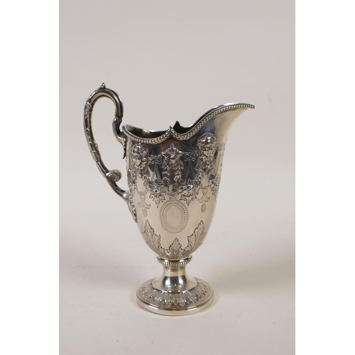602 - A fine Victorian silver three piece tea set by Martin, Hall & Co, London, 1876, decorated with r... 