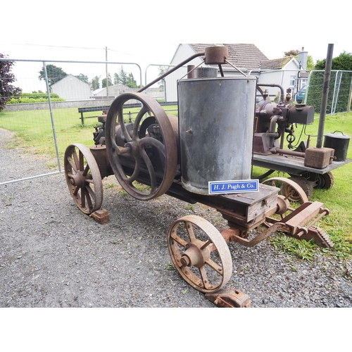 78 - R. Hornsby open crank portable engine on iron wheeled trolley. S/n 44995