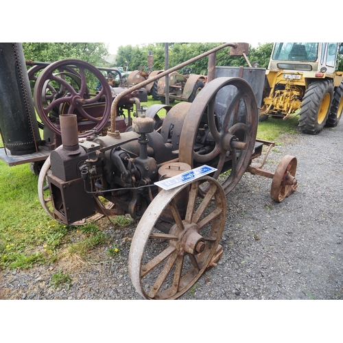 78 - R. Hornsby open crank portable engine on iron wheeled trolley. S/n 44995