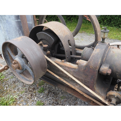 78 - R. Hornsby open crank portable engine on iron wheeled trolley. S/n 44995