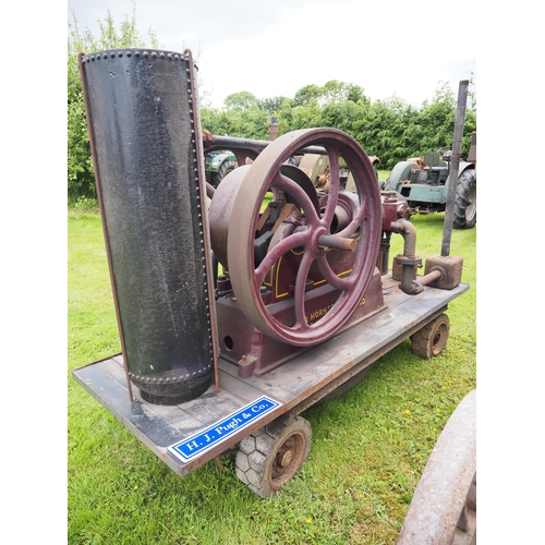 79 - R. Hornsby & Sons open crank engine. Fitted on strong trolley. S/n 33942. Believed to be 3½hp