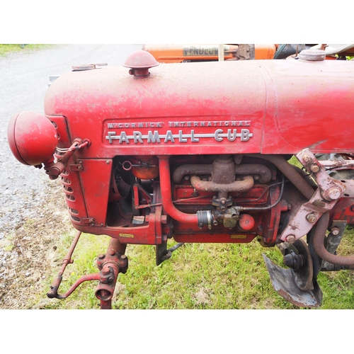 86 - McCormick International Farmall Cub tractor. Fitted with front and rear wheel weights and Mid mounte... 