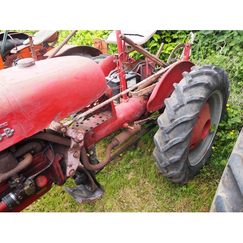 86 - McCormick International Farmall Cub tractor. Fitted with front and rear wheel weights and Mid mounte... 