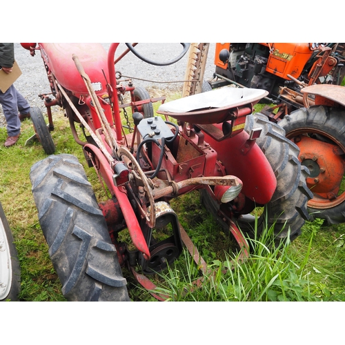 86 - McCormick International Farmall Cub tractor. Fitted with front and rear wheel weights and Mid mounte... 