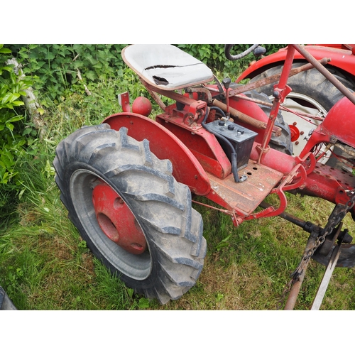 86 - McCormick International Farmall Cub tractor. Fitted with front and rear wheel weights and Mid mounte... 