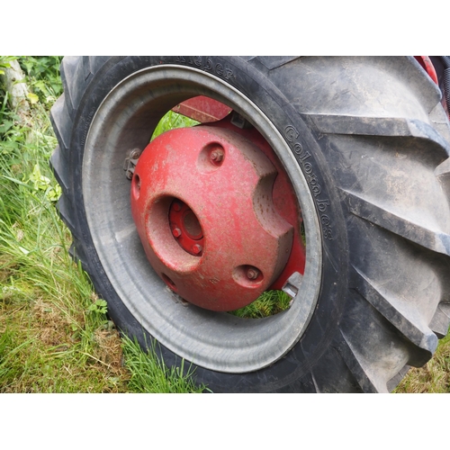 86 - McCormick International Farmall Cub tractor. Fitted with front and rear wheel weights and Mid mounte... 