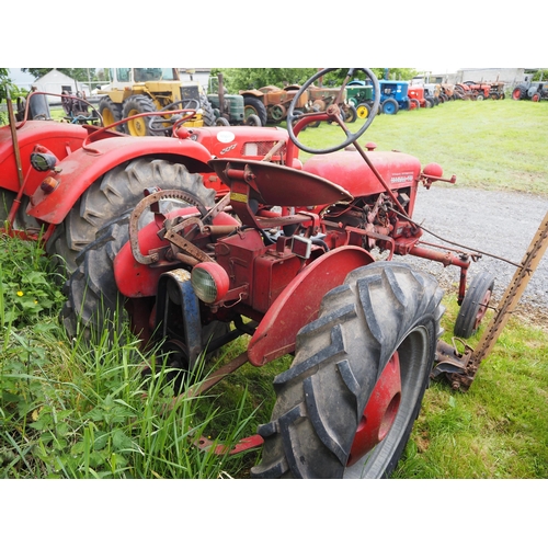 86 - McCormick International Farmall Cub tractor. Fitted with front and rear wheel weights and Mid mounte... 
