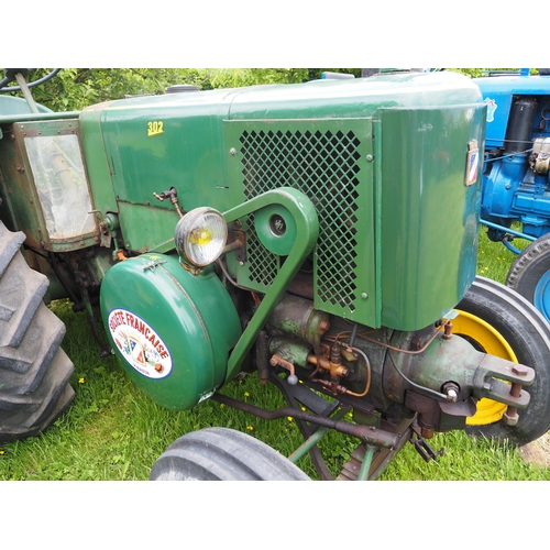 93 - SFV 302 Hot bulb tractor. Fitted with rear wheel weights. Part restored