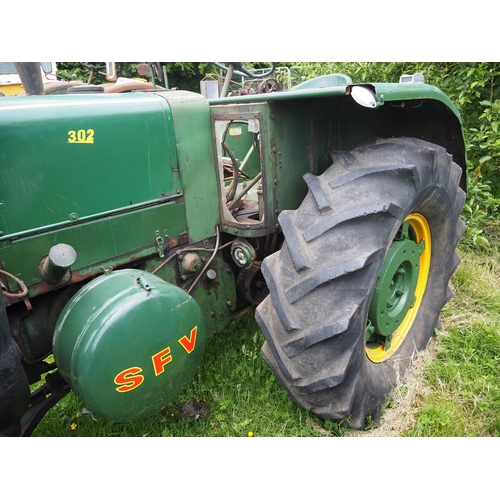 93 - SFV 302 Hot bulb tractor. Fitted with rear wheel weights. Part restored