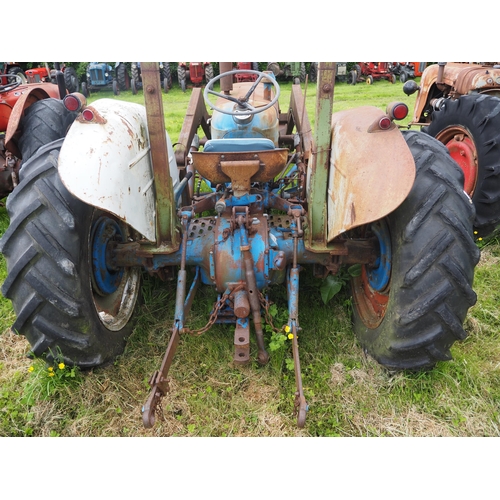 99 - Fordson Super Dexta tractor. Fitted with Horndraulic loader and bucket and roll bar