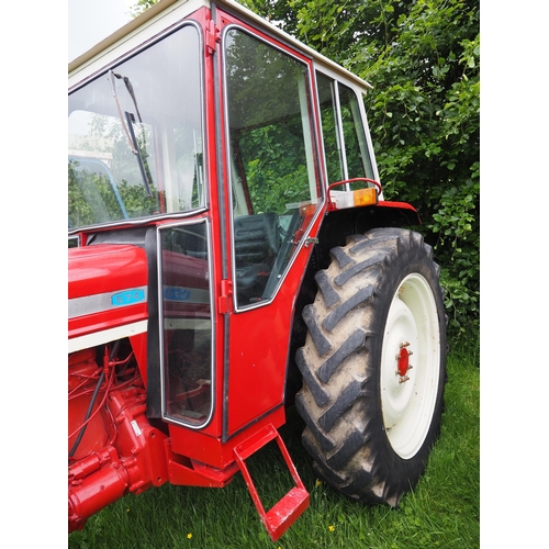 106 - International 574 tractor. Runs and drives. Fitted with pick up hitch. Showing 6985 Hours. Restored