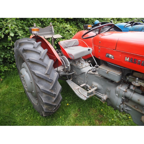 107 - Massey Ferguson 65 tractor. Runs and drives. C/w with Ferguson winch. Restored