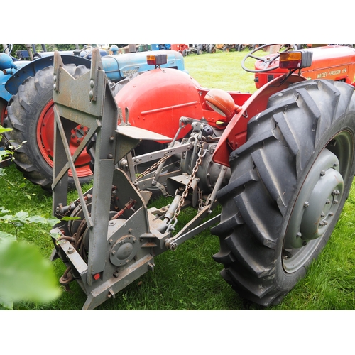 107 - Massey Ferguson 65 tractor. Runs and drives. C/w with Ferguson winch. Restored