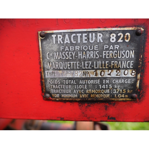114 - Massey Harris 820 tractor. Fitted with lights and mid mounted finger bar mower. S/n 107208