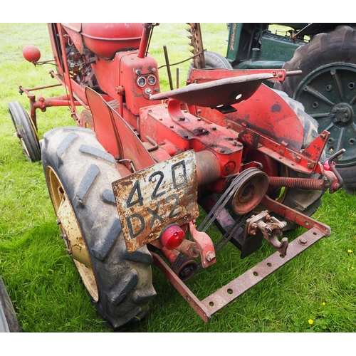 114 - Massey Harris 820 tractor. Fitted with lights and mid mounted finger bar mower. S/n 107208