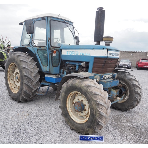 137 - Ford TW20 tractor. Runs and drives. Fitted with PVAT rear wheels, pick up hitch inner and outer rear... 