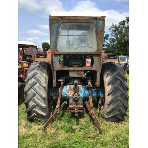 128 - Ford 5000 Tractor. Fitted with Duncan cab. Showing 5594 Hours