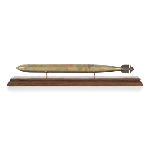 271 - A BRASS DESK MODEL FOR AN EARLY TORPEDO, POSSIBLY WHITEHEAD, CIRCA 1884
constructed in four sections... 