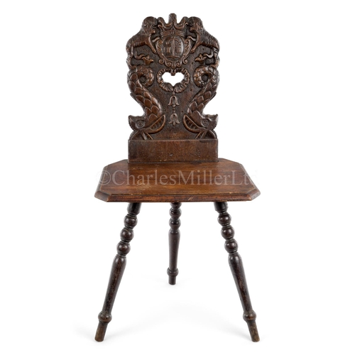 32 - AN OAK SOLID-SEAT THREE-LEGGED CHAIR, POSSIBLY DUTCH, MID-19TH CENTURY 
The cartouche-shaped back ca... 