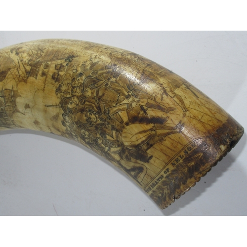 189 - A VICTORIAN SCRIMSHAW DECORATED POWDER HORN COMMEMORATING TRAFALGAR 
incised in the round with the d... 