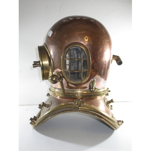 263 - A SIX-BOLT ADMIRALTY-PATTERN COPPER AND BRASS DIVING HELMET BY SIEBE GORMAN & CO LTD LONDON
the ... 