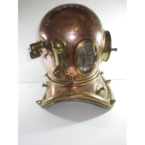 263 - A SIX-BOLT ADMIRALTY-PATTERN COPPER AND BRASS DIVING HELMET BY SIEBE GORMAN & CO LTD LONDON
the ... 