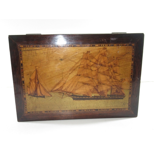 36 - A TRINITY HOUSE MARQUETRY INLAID WORK BOX, CIRCA 1870
the lid depicting a pilot cutter approaching a... 