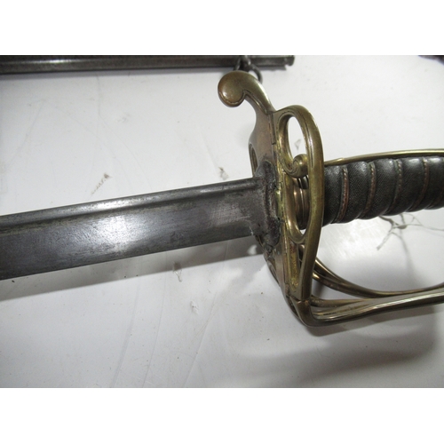 225 - AN EAST INDIA COMPANY SWORD, CIRCA 1830
with 32in. etched pipe backed blade, half basket hilt with h... 