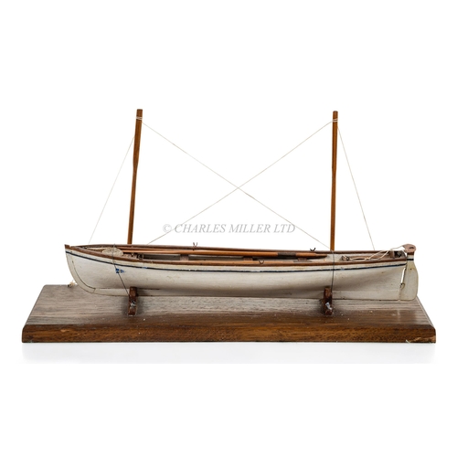 15 - 19TH CENTURY SAILOR-TYPE MODEL FOR A CORNISH PILOT GIG with 11in. hull carved from the solid and con... 