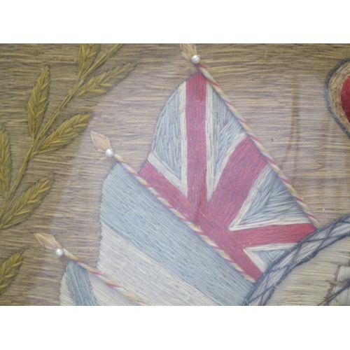 163 - A SAILOR'S PATRIOTIC WOOLWORK, CIRCA 1850Simple cartouche of a man-of-war underway, flanked by natio... 