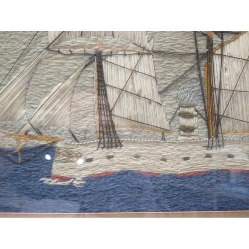 180 - A SAILOR'S WOOLWORK PICTURE OF AN IRONCLAD, CIRCA 1860depicted under steam and half sail, in a blue ... 