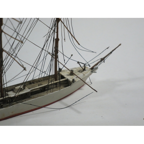 42 - A 1:600 WATERLINE MODEL OF S.S. SCOT BY BASSETT-LOWKE hull carved from solid with painted deck with ... 