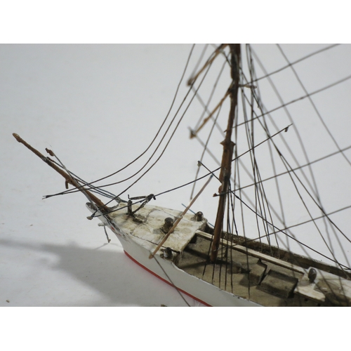 42 - A 1:600 WATERLINE MODEL OF S.S. SCOT BY BASSETT-LOWKE hull carved from solid with painted deck with ... 