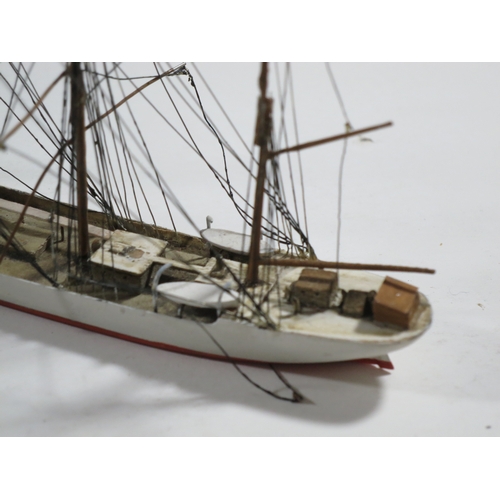 42 - A 1:600 WATERLINE MODEL OF S.S. SCOT BY BASSETT-LOWKE hull carved from solid with painted deck with ... 