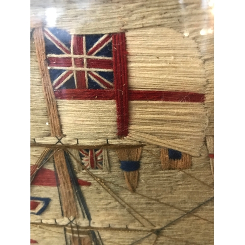 161 - A FINE SAILOR'S WOOLWORK PICTURE OF H.M.S. NILE DRESSED OVERALL, CIRCA 1855depicted with a retracted... 