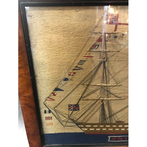 161 - A FINE SAILOR'S WOOLWORK PICTURE OF H.M.S. NILE DRESSED OVERALL, CIRCA 1855depicted with a retracted... 