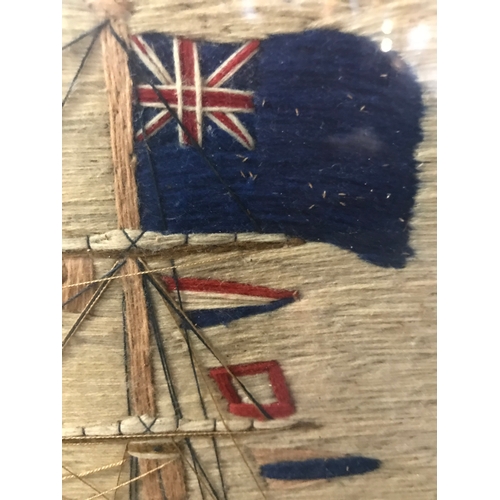 161 - A FINE SAILOR'S WOOLWORK PICTURE OF H.M.S. NILE DRESSED OVERALL, CIRCA 1855depicted with a retracted... 