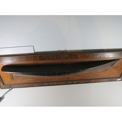 36 - A 19TH CENTURY HALF MODEL OF THE FAMOUS YACHT AMERICA the 36in. hull carved from the solid with inla... 